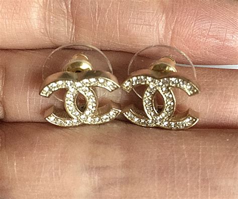 fake chanel studs|genuine chanel earrings.